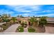 Breathtaking aerial view showcases this impeccably landscaped desert home with a charming curb appeal at 28247 N 128Th Dr, Peoria, AZ 85383