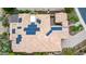 Aerial view showcases the tile roof covered in a modern and efficient solar panel array at 28247 N 128Th Dr, Peoria, AZ 85383