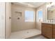 Modern bathroom featuring a walk-in shower with stylish tile work at 3258 E Dover St, Mesa, AZ 85213