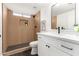 Modern bathroom with a walk-in shower and white vanity at 3258 E Dover St, Mesa, AZ 85213