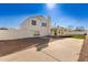 House exterior showcasing a two-story home and backyard at 3258 E Dover St, Mesa, AZ 85213