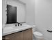 Clean powder room with modern vanity and fixtures at 34045 N Borgata Trl, Queen Creek, AZ 85144