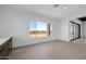 Bright dining area with large window and backyard view at 34045 N Borgata Trl, Queen Creek, AZ 85144