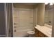 Bathroom with shower/tub combo and double vanity at 3405 W Danbury Dr # D121, Phoenix, AZ 85053