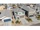 Two-story house aerial view, showing the neighborhood and landscaping at 35298 W San Ildefanso Ave, Maricopa, AZ 85138