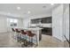 Modern kitchen with granite countertops and stainless steel appliances at 35298 W San Ildefanso Ave, Maricopa, AZ 85138