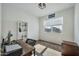 Bright home office with built-in shelving and large window at 35298 W San Ildefanso Ave, Maricopa, AZ 85138