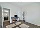 Home office features built-in shelving and a desk at 35298 W San Ildefanso Ave, Maricopa, AZ 85138