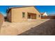 New construction home with a large, unlandscaped backyard and block wall at 3923 W Hayduk Rd, Laveen, AZ 85339