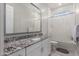 Bathroom with granite countertop, single sink vanity, and tub at 3923 W Hayduk Rd, Laveen, AZ 85339