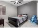 Bedroom with a full-size bed and ceiling fan at 3923 W Hayduk Rd, Laveen, AZ 85339