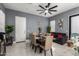 Dining area features a large table, seating for six and gray walls at 3923 W Hayduk Rd, Laveen, AZ 85339