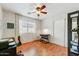 Bedroom with a workspace and built-in shelving at 40136 N Costa Del Sol Dr, San Tan Valley, AZ 85140