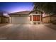 Curb appeal abounds at this charming one-story home featuring a two-car garage at 40136 N Costa Del Sol Dr, San Tan Valley, AZ 85140