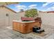 Relaxing hot tub with wooden cabinetry and steps at 40136 N Costa Del Sol Dr, San Tan Valley, AZ 85140