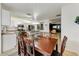 Bright kitchen with an island and dining area at 40136 N Costa Del Sol Dr, San Tan Valley, AZ 85140