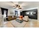 Spacious living room with a neutral color palette and ample natural light at 40136 N Costa Del Sol Dr, San Tan Valley, AZ 85140