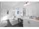 Modern bathroom with soaking tub and walk-in shower at 4752 S Orbit Ave, Mesa, AZ 85212