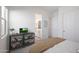 Bedroom with en-suite bathroom and TV stand at 4752 S Orbit Ave, Mesa, AZ 85212