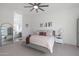 Main bedroom with ensuite bathroom and large mirror at 4752 S Orbit Ave, Mesa, AZ 85212