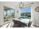 Dining area with view of the pool and backyard through sliding doors at 4752 S Orbit Ave, Mesa, AZ 85212