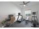 Home gym with treadmill, elliptical, and weights at 4752 S Orbit Ave, Mesa, AZ 85212