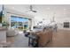 Bright and airy living room with sliding doors leading to backyard oasis at 4752 S Orbit Ave, Mesa, AZ 85212