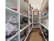 Large pantry with extensive shelving for food storage at 4752 S Orbit Ave, Mesa, AZ 85212