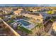 Aerial view of house with pool and solar panels at 4907 W Faull Dr, New River, AZ 85087