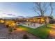 Spacious backyard oasis with pool, pergola, and artificial turf at 4907 W Faull Dr, New River, AZ 85087