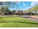 Community center with landscaping and flagpoles at 4907 W Faull Dr, New River, AZ 85087