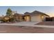 Charming house with two-car garage and front yard at 4907 W Faull Dr, New River, AZ 85087