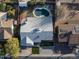 Aerial view of the property showcasing the spacious layout, pool, and landscaping at 5045 W Mescal St, Glendale, AZ 85304