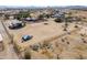 Expansive aerial view of property with large lot and outbuildings ready for new owner at 50530 W Mockingbird Ln, Maricopa, AZ 85139