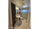 View of a modern bathroom featuring pedestal sink and glass enclosed shower at 50530 W Mockingbird Ln, Maricopa, AZ 85139