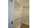 Walk-in closet with built-in shelving and hanging rods at 50530 W Mockingbird Ln, Maricopa, AZ 85139