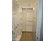 Walk-in closet with built-in storage and shelving at 50530 W Mockingbird Ln, Maricopa, AZ 85139