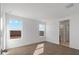 Bright bedroom with two windows and plush carpeting at 5552 E Rock Bush Ln, San Tan Valley, AZ 85140