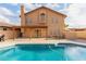 Two story home with covered patio, sparkling pool and BBQ area at 5766 W Brown St, Glendale, AZ 85302