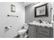 Guest bathroom with granite countertop and updated vanity at 5766 W Brown St, Glendale, AZ 85302