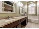 Bathroom with double sinks and granite countertop at 5766 W Brown St, Glendale, AZ 85302