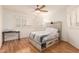 Bedroom with wood flooring and built-in drawers at 5766 W Brown St, Glendale, AZ 85302