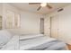 Bright bedroom with double bed, window shutters, and ample closet space at 5766 W Brown St, Glendale, AZ 85302