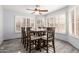 Bright dining area with wood table and chairs near windows at 5766 W Brown St, Glendale, AZ 85302