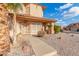 Front entry with walkway, landscaping, and a view of the house at 5766 W Brown St, Glendale, AZ 85302