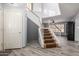 Interior view of a staircase with gray walls and wood accents at 5766 W Brown St, Glendale, AZ 85302