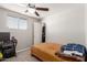 Bright bedroom with a single bed and built-in closet at 6033 S 19Th Pl, Phoenix, AZ 85042