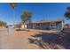 Newly painted home with front yard landscaping and walkway at 6033 S 19Th Pl, Phoenix, AZ 85042