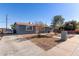 Newly painted home with driveway and front yard at 6033 S 19Th Pl, Phoenix, AZ 85042