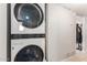 Stackable washer and dryer in convenient laundry room at 6033 S 19Th Pl, Phoenix, AZ 85042